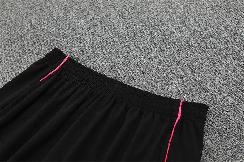 Gunners Black (Pink Strips) Tracksuit 2025/26