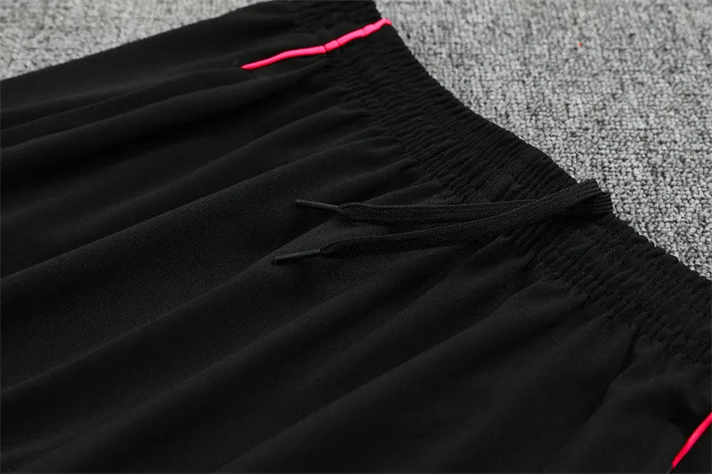 Gunners Black (Pink Strips) Tracksuit 2025/26