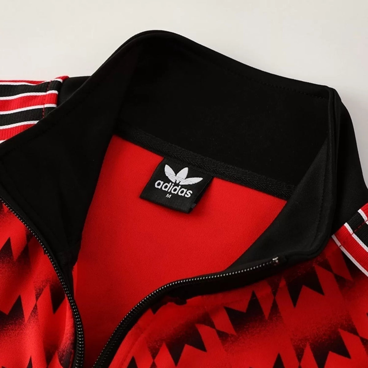 Manchester United Black (Red Design in Front) Anthem Jacket - 2025/26